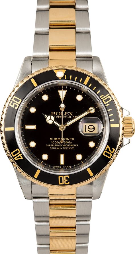 rolex submariner black and gold how much weight in gold